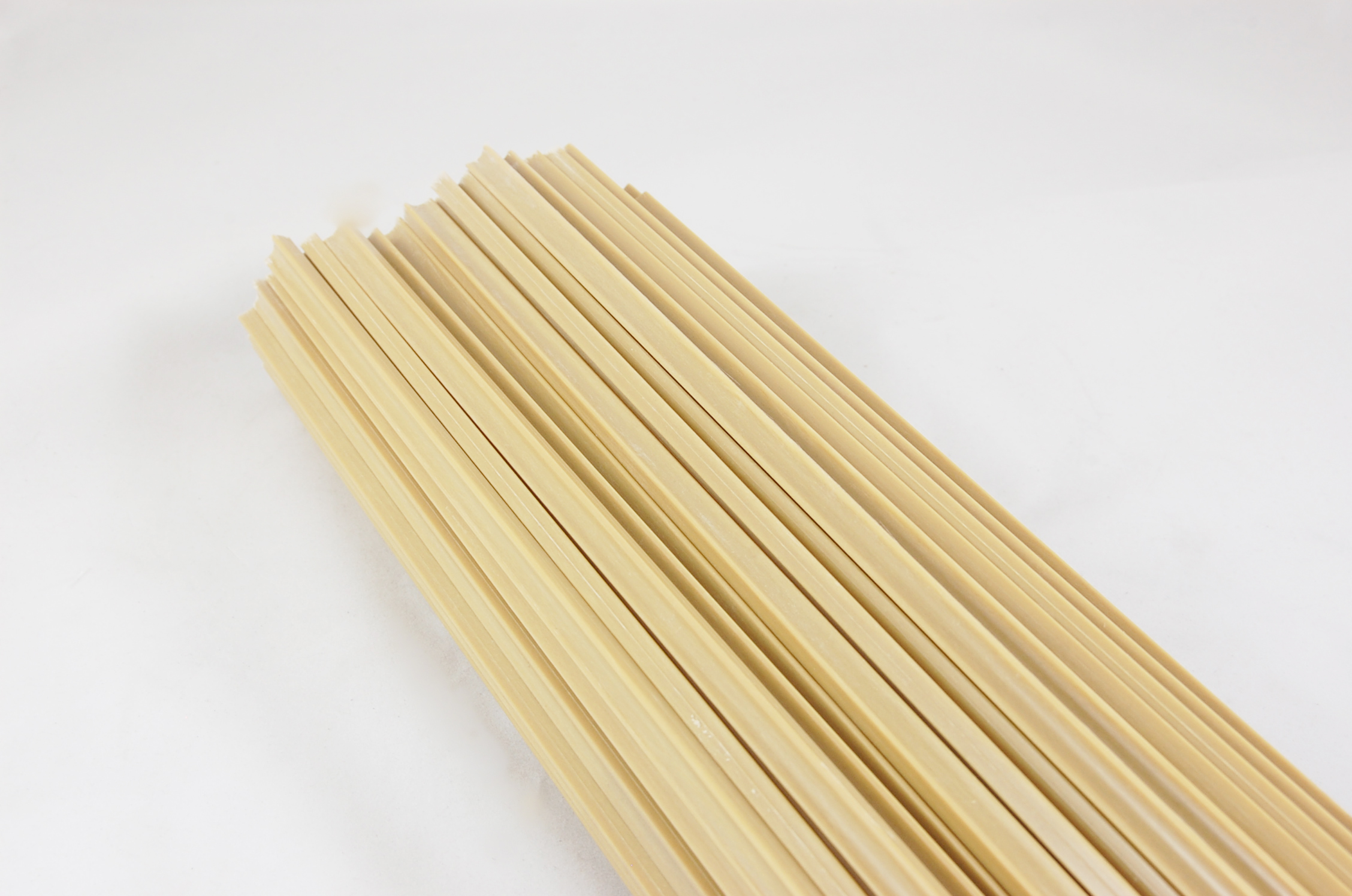 3/8" x 1" GLASROD® Grade SG-200 High-Strength & High-Temperature Fiberglass-Reinforced Polyester Laminate Dogbone  220°C, tan, 32 dogbone x 288'  per bundle