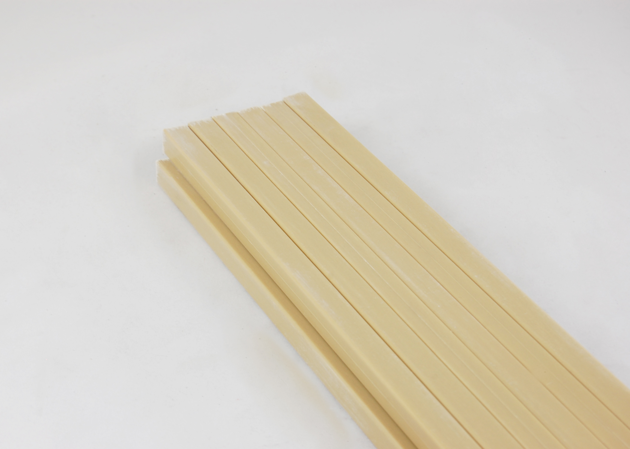 3/8" x 5/8" GLASROD® 0610 Grade SG-200 High-Strength & High-Temperature Fiberglass-Reinforced Polyester Laminate Rectangular Bar, tan,  48 rods x 432'  per bundle